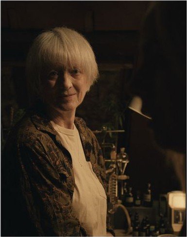 Portrait of Dorothy in her warmly lit attic